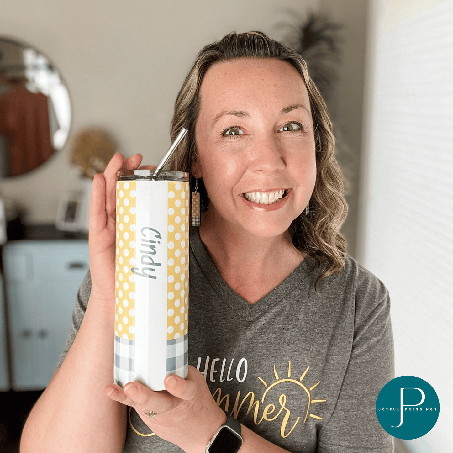 model holding a "Hello Summer" tumbler personalized