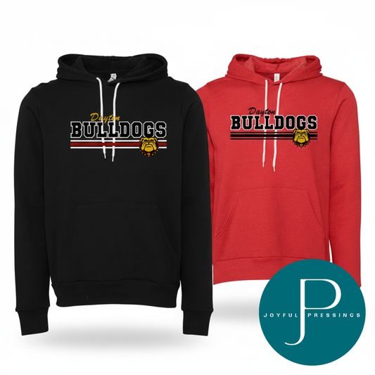 Two hooded sweatshirts shown side by side on a white background: a black hoodie with a white drawstring and a red hoodie with a white drawstring. Both have a front graphic reading 'Dayton BULLDOGS' with horizontal red, white, and black stripes and a bulldog emblem.