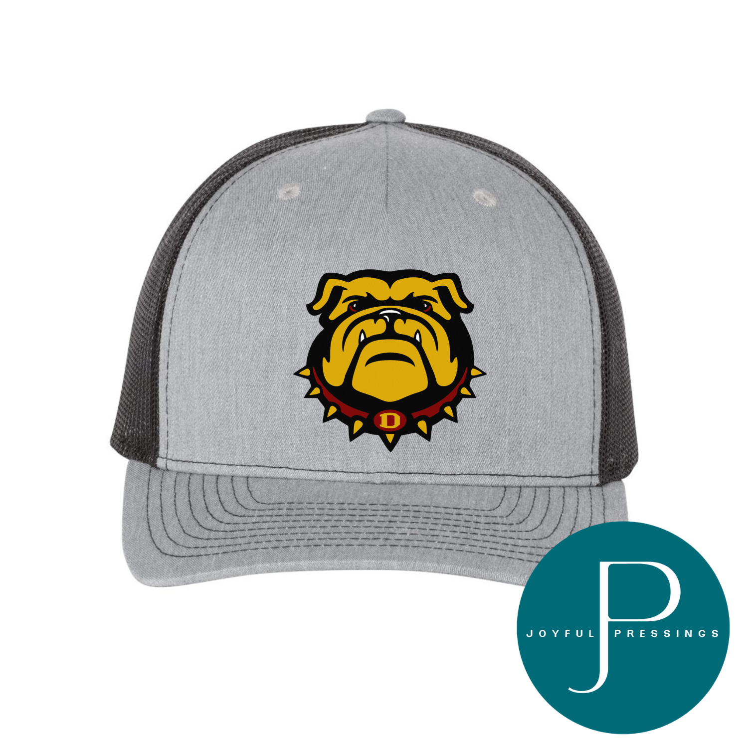 A heather gray and black trucker hat featuring a yellow bulldog mascot logo with a red collar and the letter 'D' on the front. A teal circular 'Joyful Pressings' brand watermark is visible in the bottom right corner.