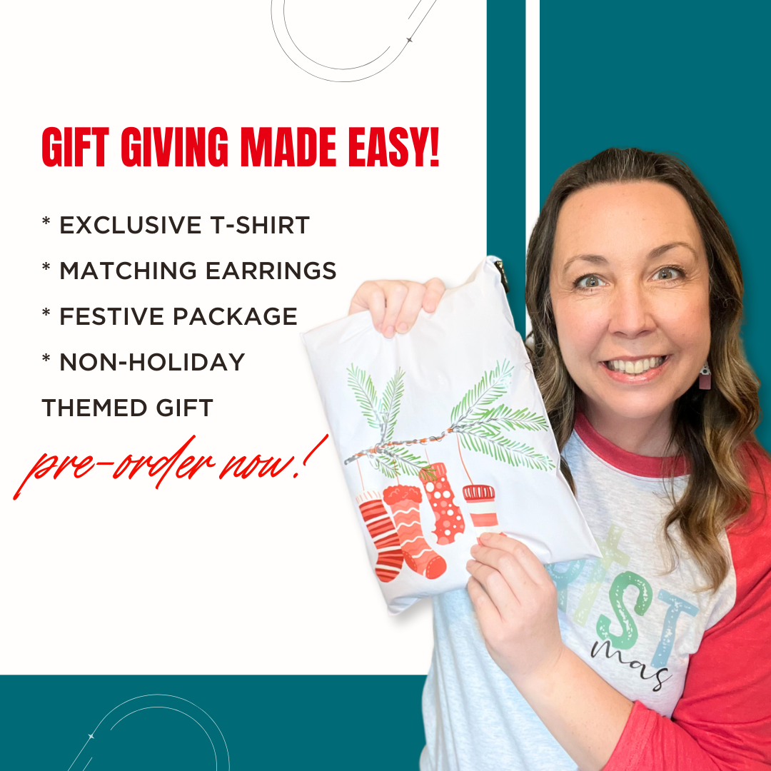 picture of model holding Christmas Gift Bundle with text showcasing what's inside: t-shirt, earrings, festive package, non-holiday themed