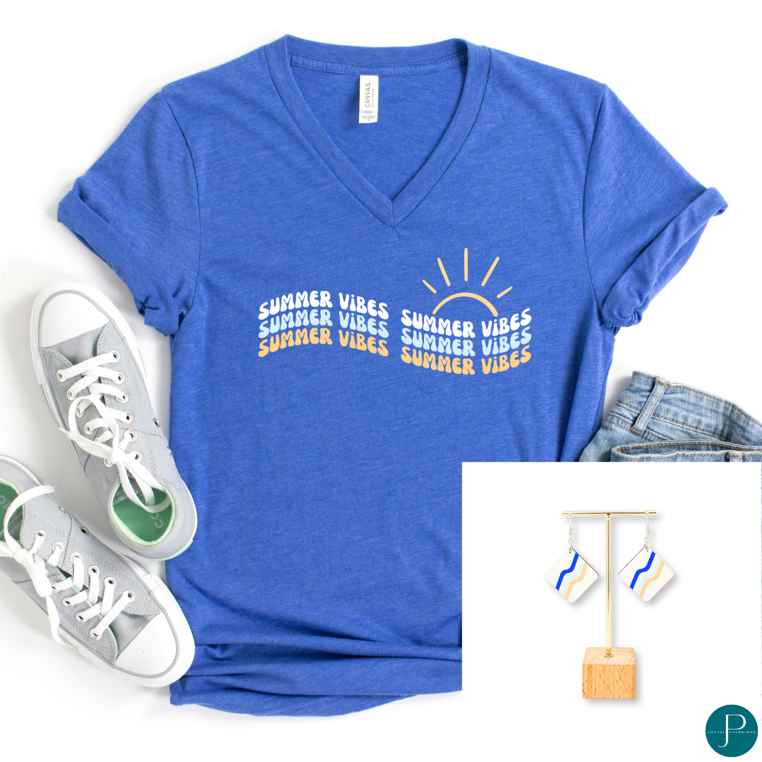 June 2024 club tee and earrings