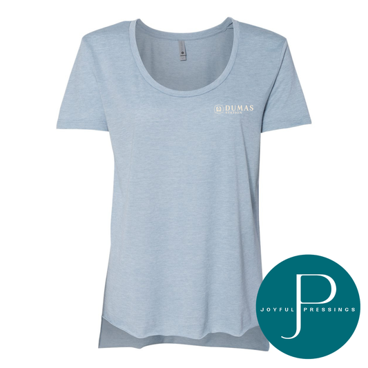A light blue heather scoop-neck t-shirt with a small white 'Dumas Presbyterian' logo on the left chest, shown on a white background with a teal circular 'Joyful Prebring' logo overlay in the bottom right corner.