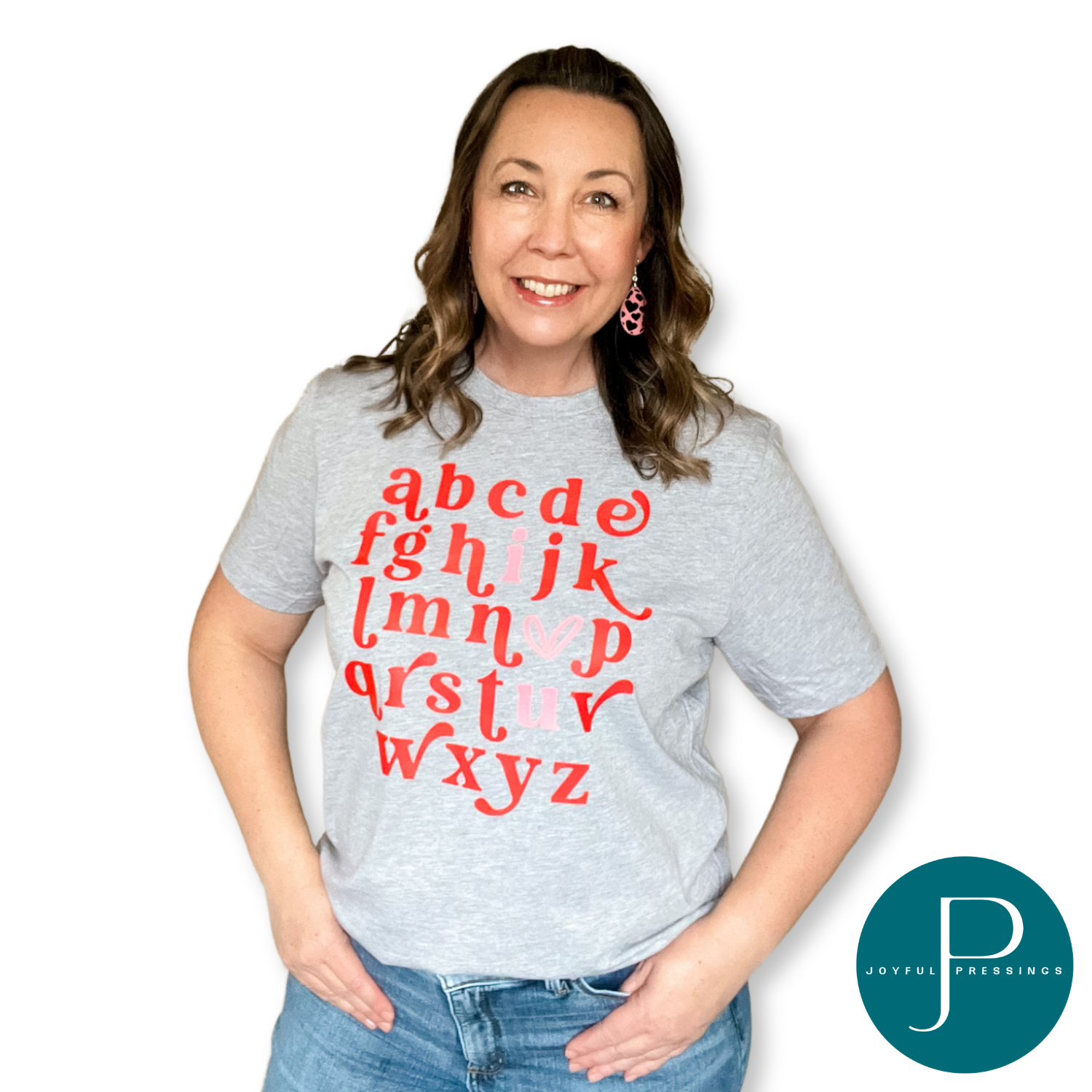 model wearing athletic heather tea with red and pink alphabet print