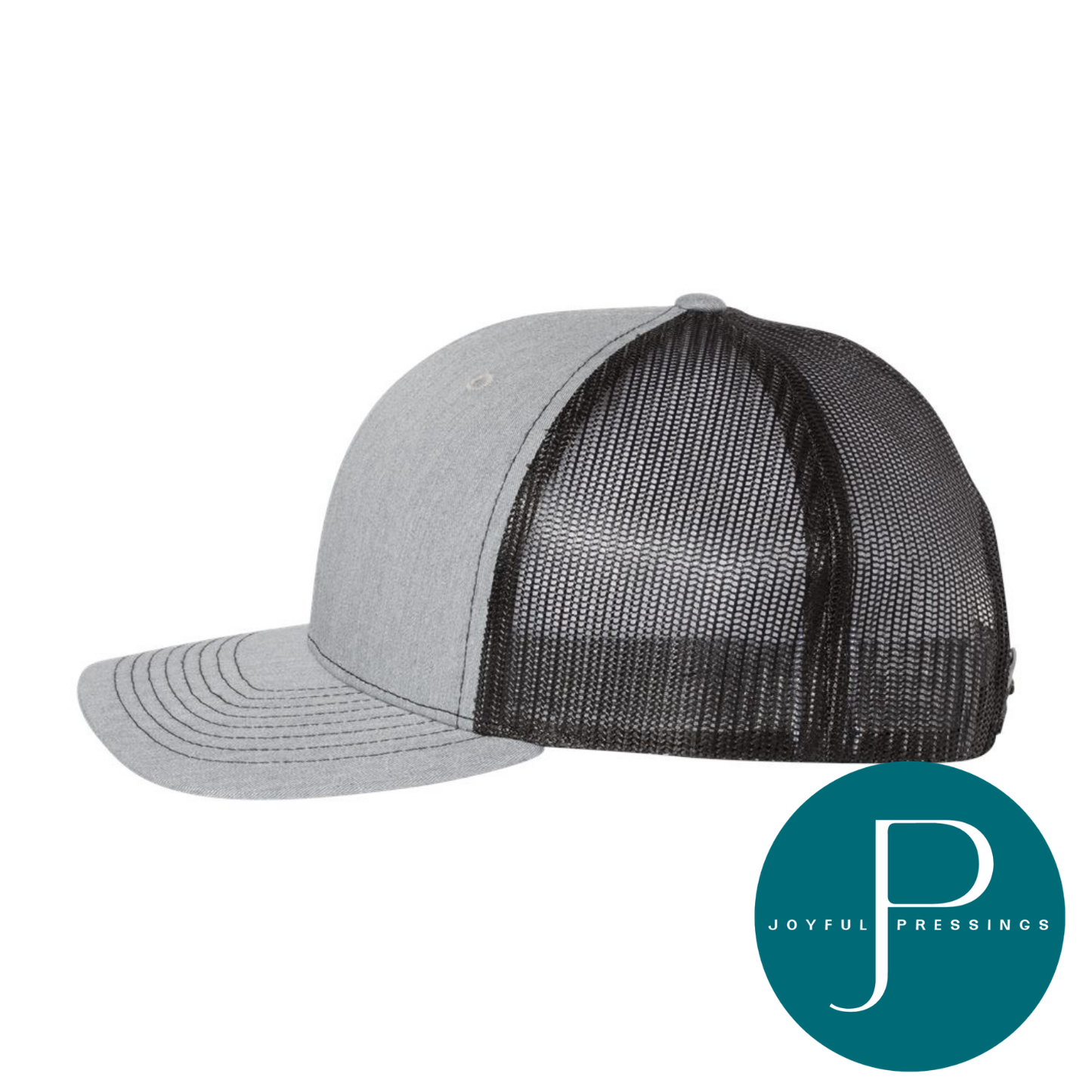 A light gray and black trucker-style baseball cap with a curved brim and black mesh back panels, shown on a white background with a teal circular Joyful Pressions logo in the bottom right corner.