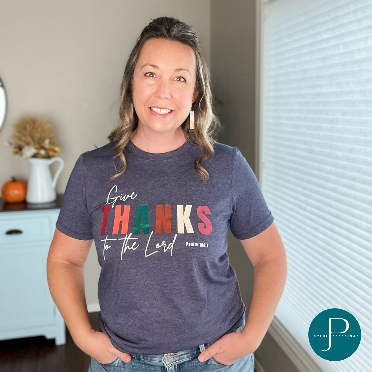 Model wearing Give Thanks to the Lord navy t-shirt.