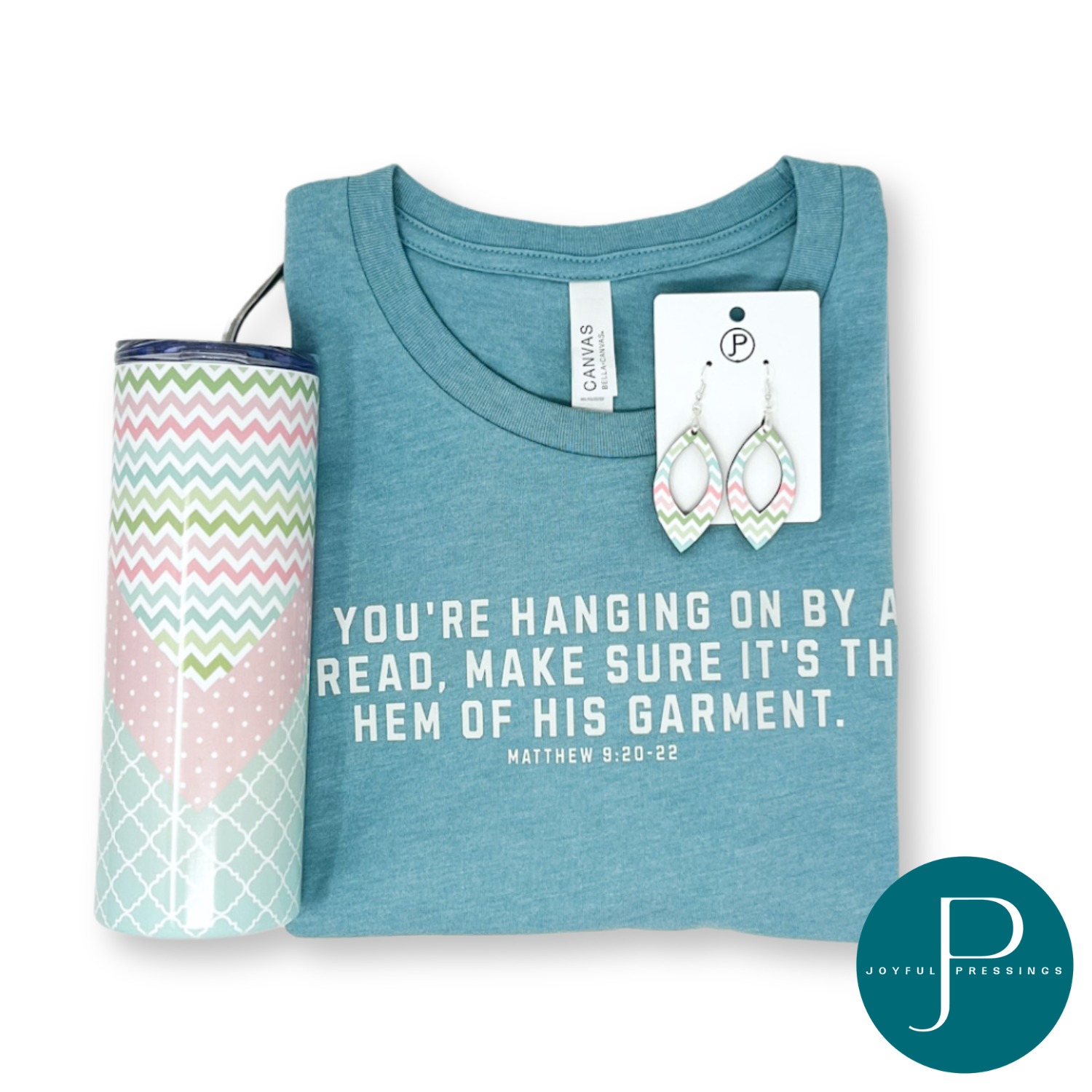 Product photo of Hanging on By a Thread Bundle.  Includes matching t-shirt, earrings, and metal 20 oz tumbler.