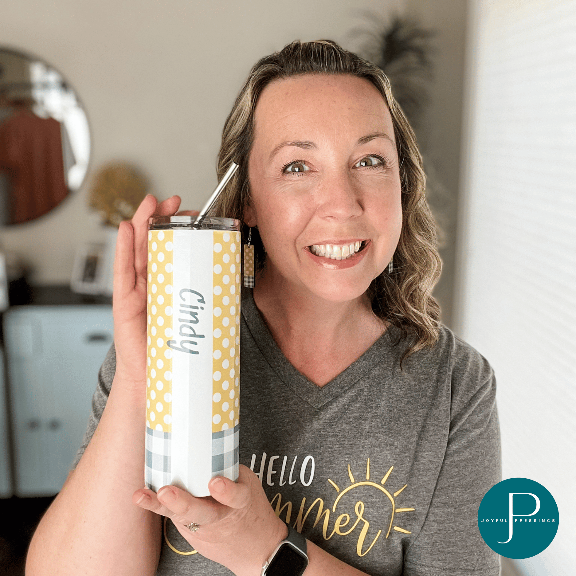 model holding a "Hello Summer" tumbler personalized
