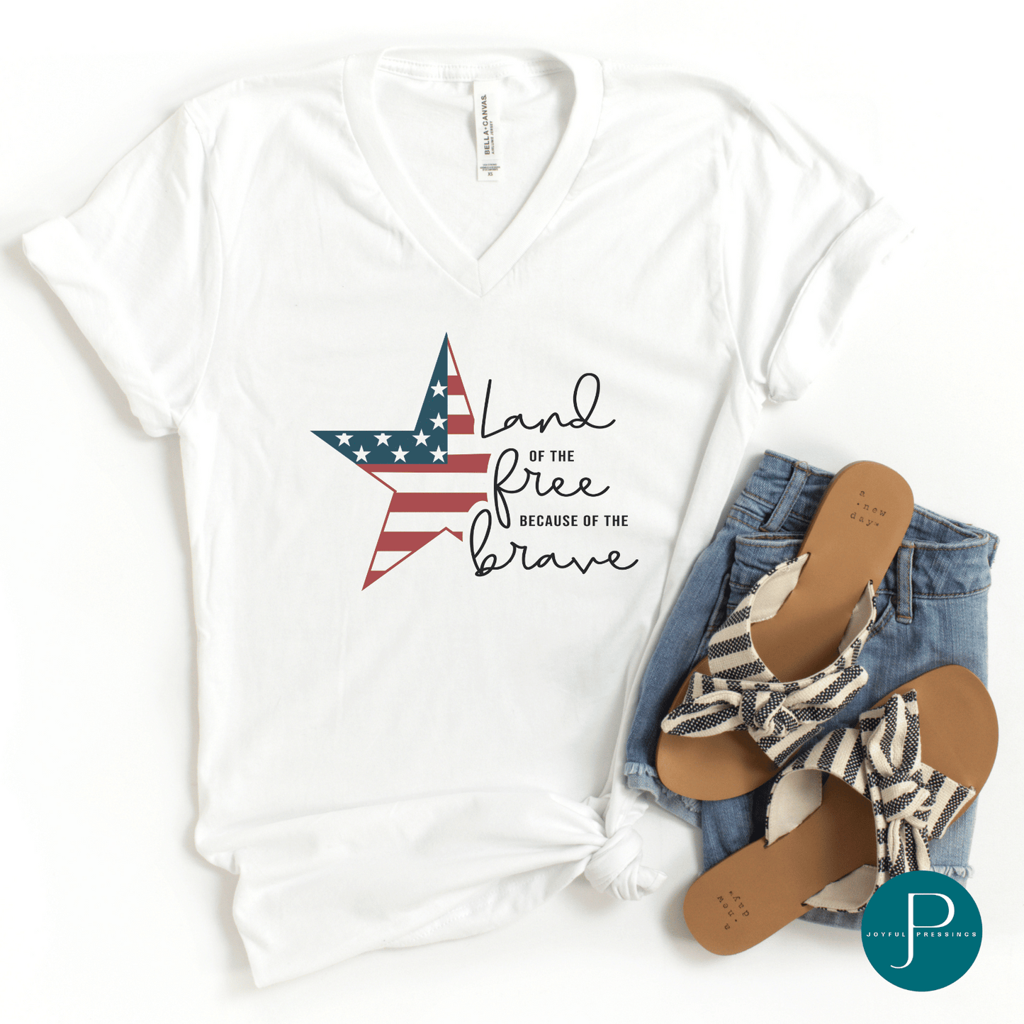 flat mockup of land of the free white v-neck t-shirt