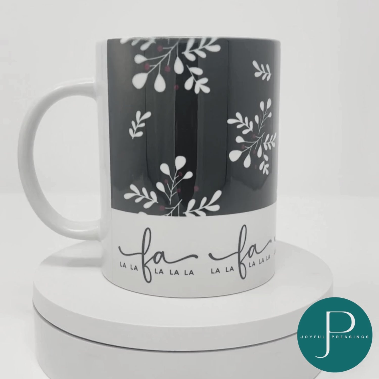 rotating video of black and white fa La La mug
