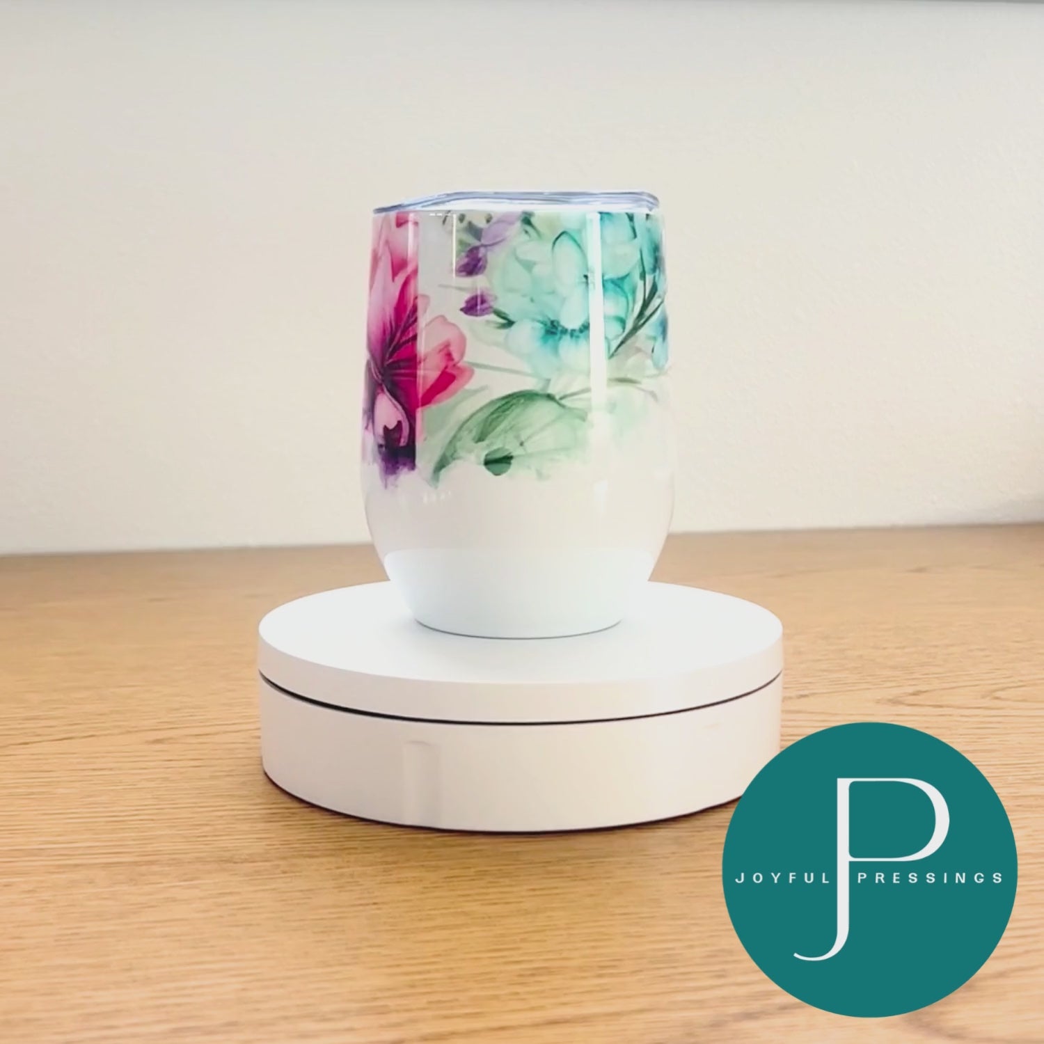 video of floral tumbler spinning around