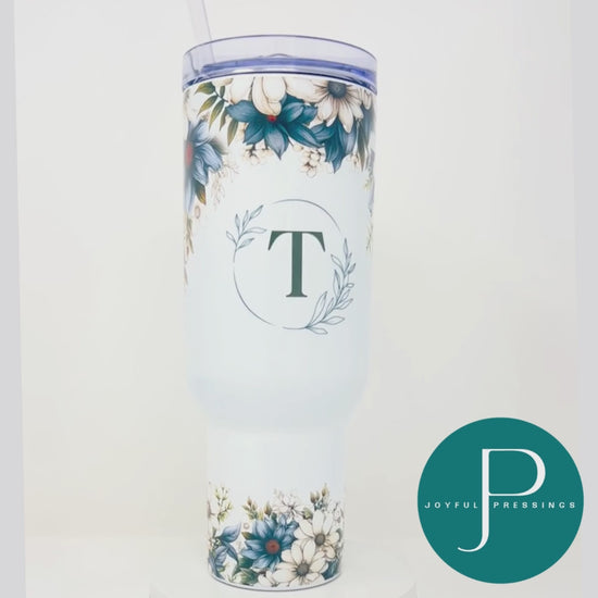 Video showcasing the blue floral tumbler personalized with the letter T.