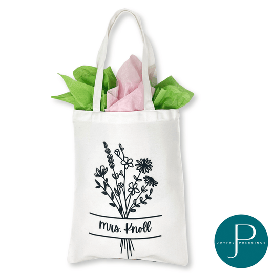 picture of floral tote with teacher's name on front