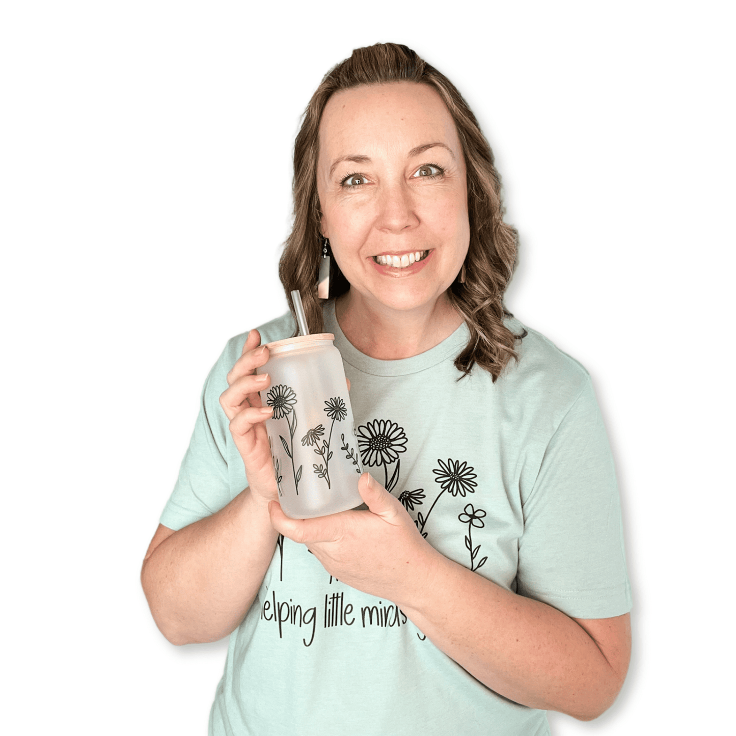 model holding wildflower glass tumbler with bamboo lid