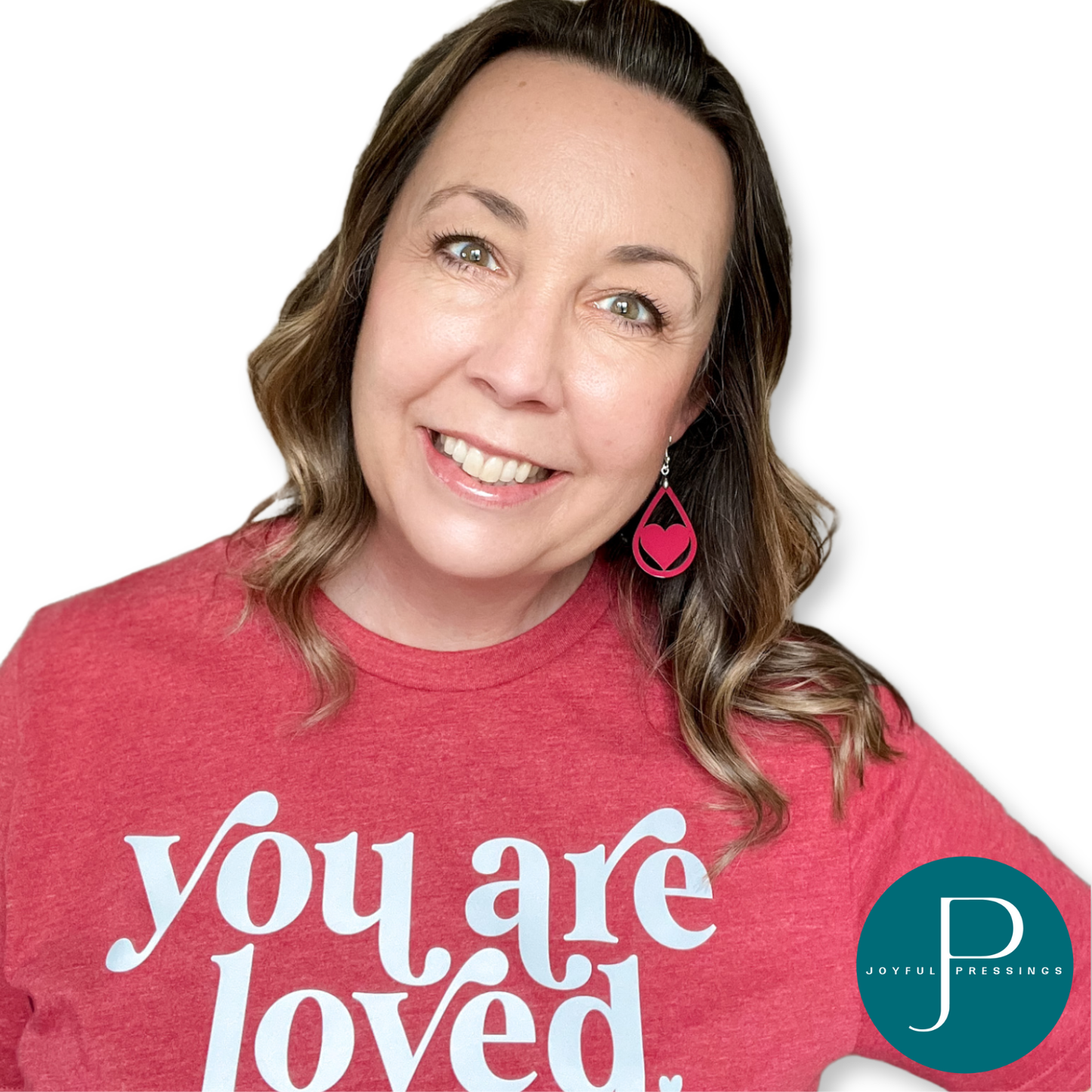 red heart teardrop earrings displayed on a model