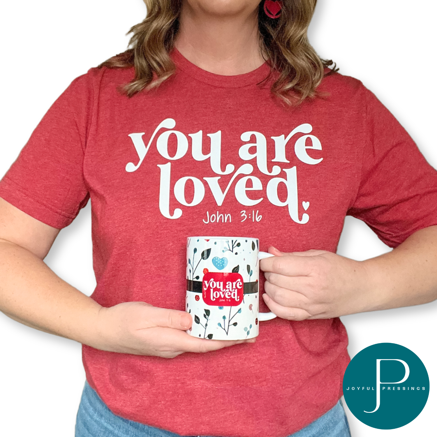 model displaying you are loved floral mug