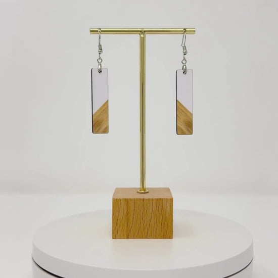 video of white and wood bar earrings