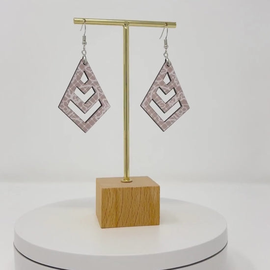 video of light pink lace macrame earrings.