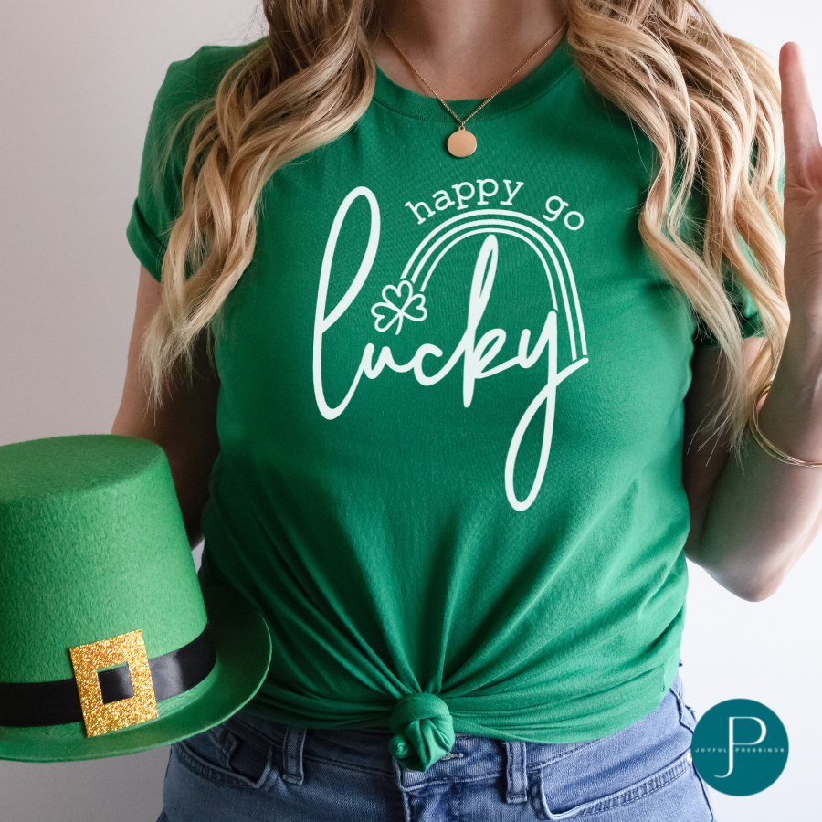 Kelly green tshirt with happy go lucky print in white.